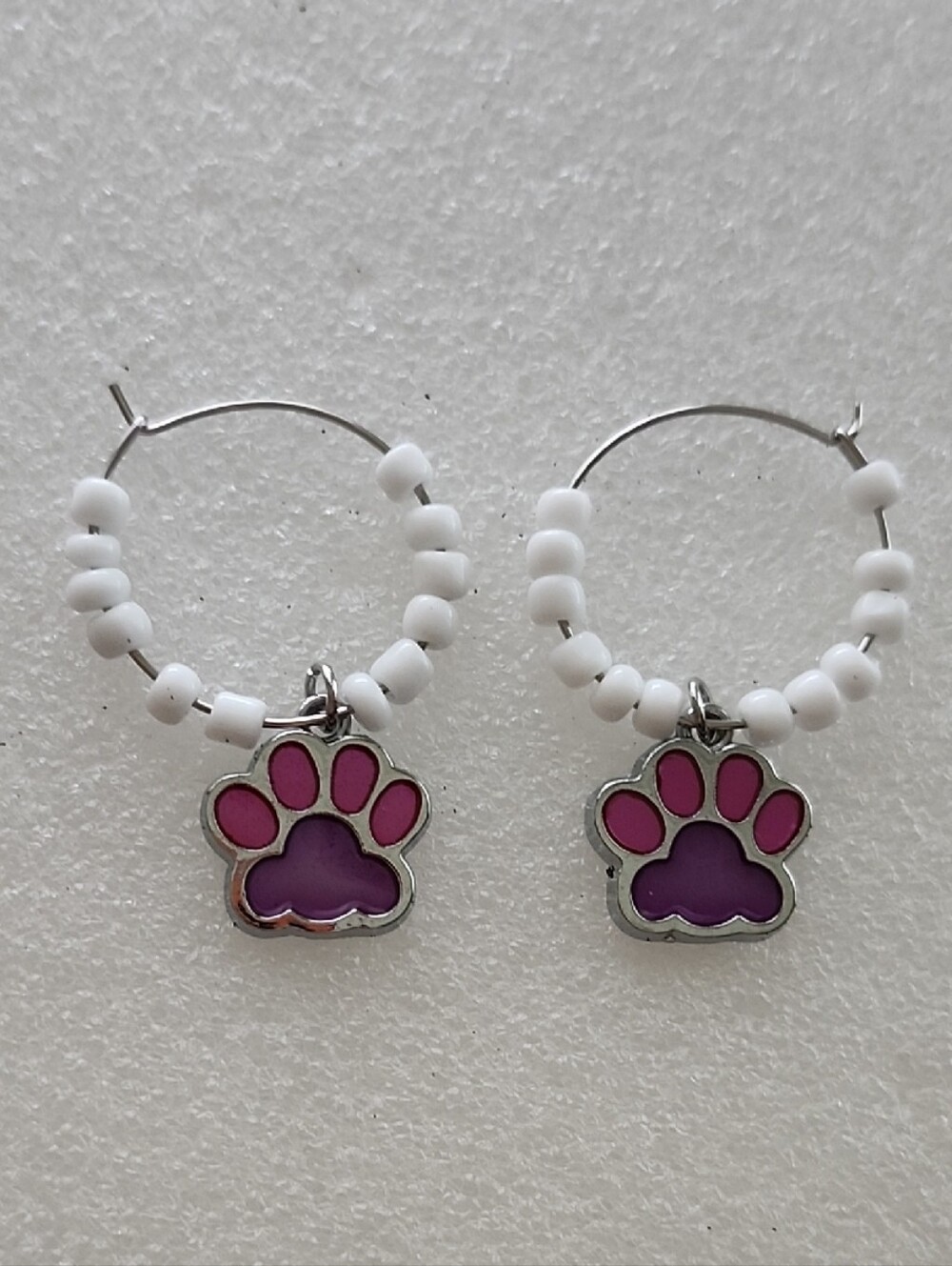 Hand Crafted White Beaded Hoop Earrings with Pink and Purple Paw Charms